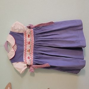 Smocked dress. Pinafore style